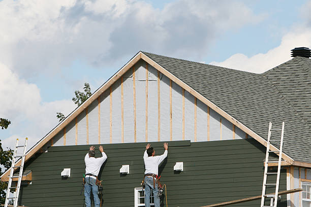 Professional Siding Replacement technician working in Henderson, CO